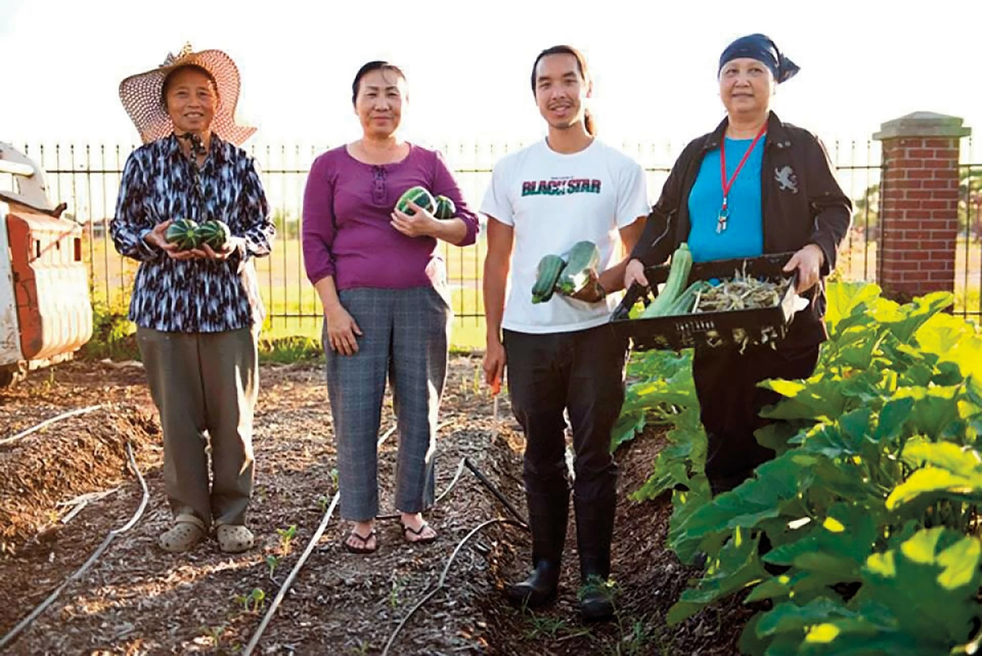 Entrepreneur Daniel Nguyen Hoai Tien (second from right) accompanies Vietnamese farmers.