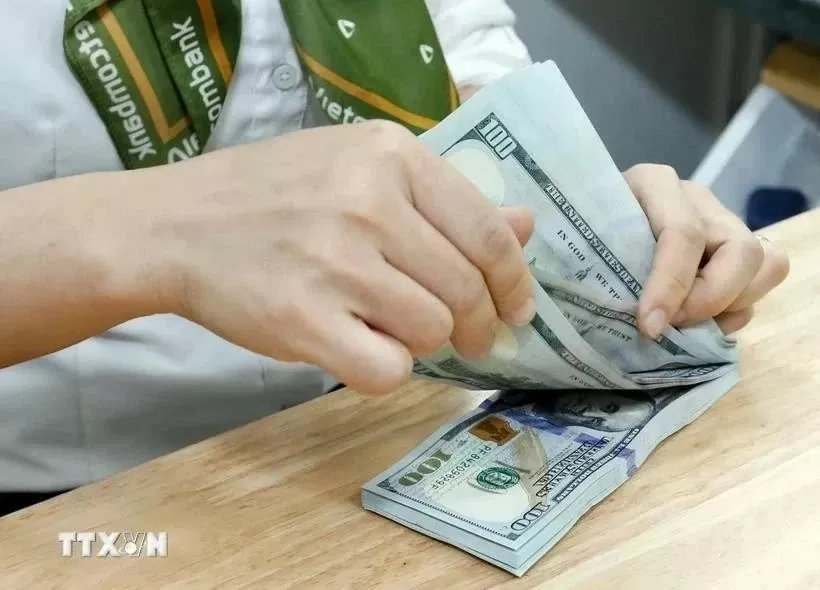 Reference exchange rate for the US dollar at 24,330 VND/USD on January 8, down 2 VND Reference exchange rate for the US dollar at 24,330 VND/USD on January 8, down 2 VND