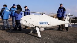 Donbass: Ukraine bị cáo buộc 'bắn phá', hạ UAV của OSCE; tiết lộ số người đã được nhập quốc tịch Nga