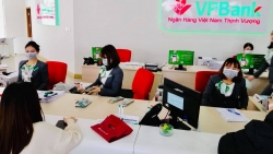 Ngân hàng đối mặt với rủi ro nợ xấu